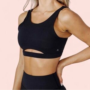 Acta women’s Sleek Black Sports Bra with Cutout Design Size XS